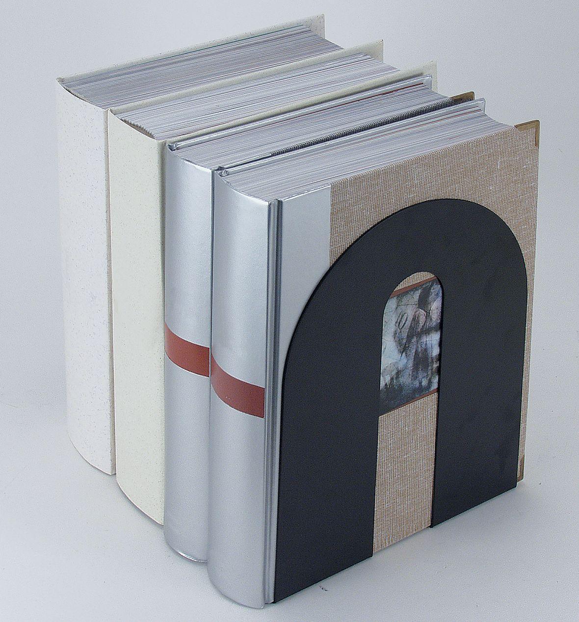 Modern bookends holding neatly stacked books, ideal for office or school desk organization and workspace decor