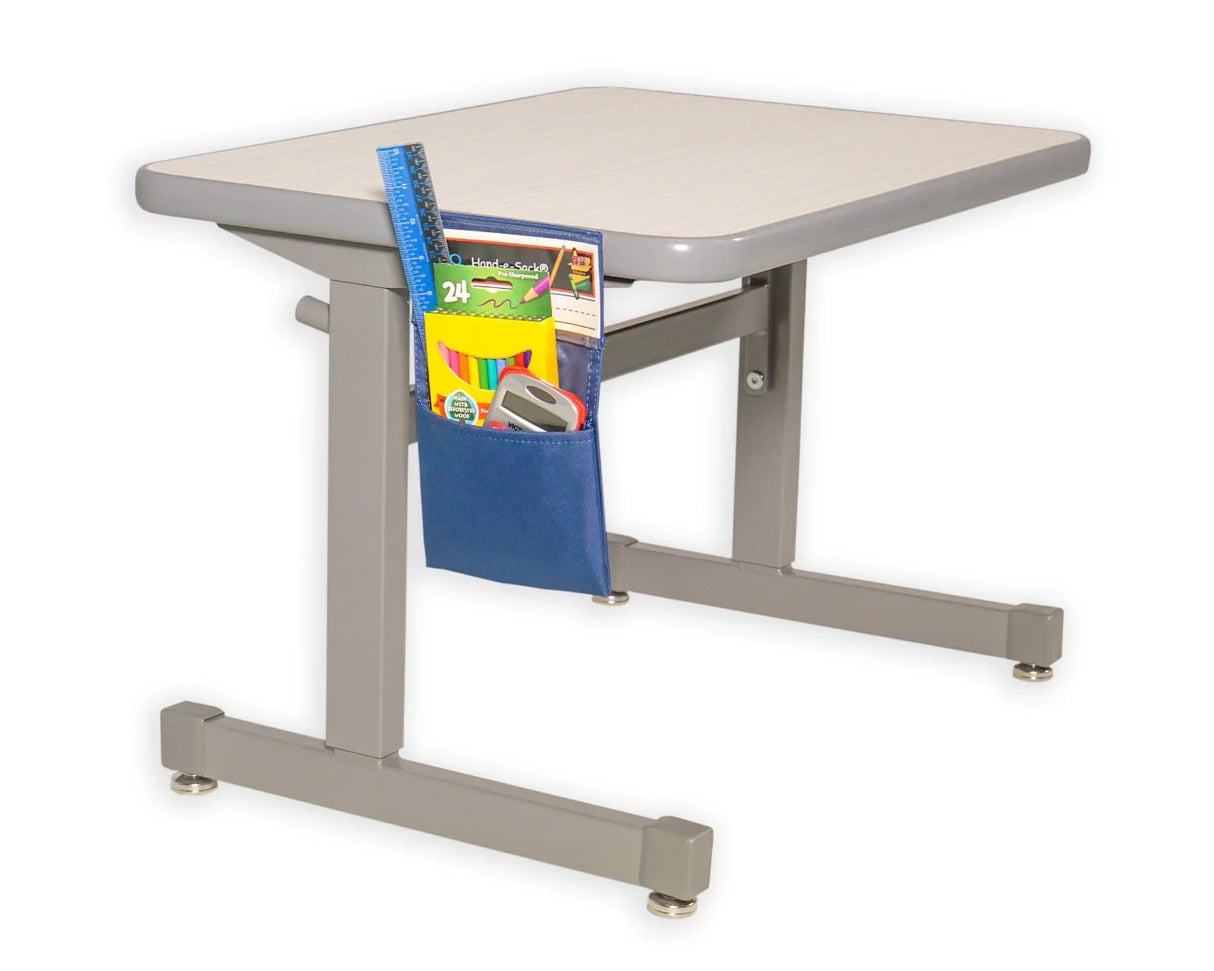 Blue desk storage pocket holding school supplies on a student desk