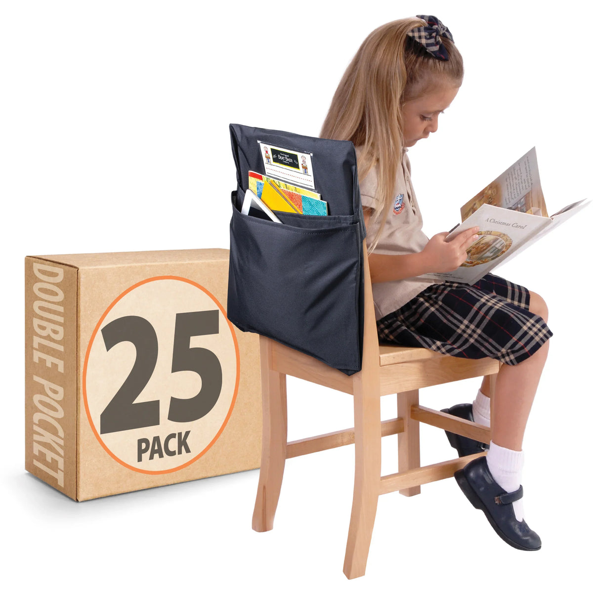 Child reading a book while sitting in a chair with a black Seat Sack double pocket organizer.