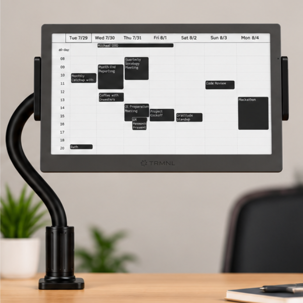 TRMNL 7.5 inch ePaper display showing a calendar, mounted on a black gooseneck clamp.