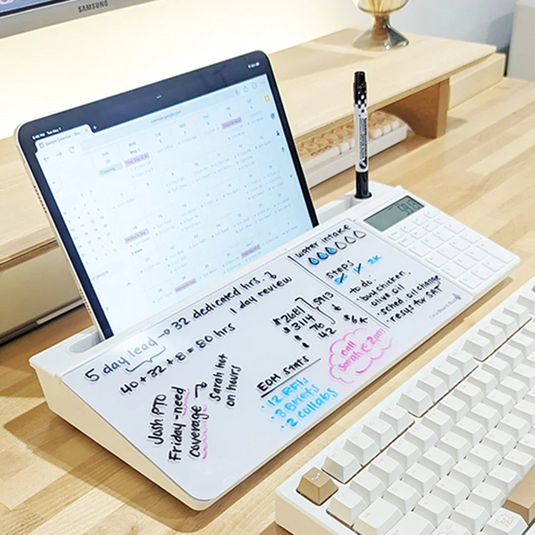 Desk organizer with built-in whiteboard, calculator, and tablet stand on a modern workspace