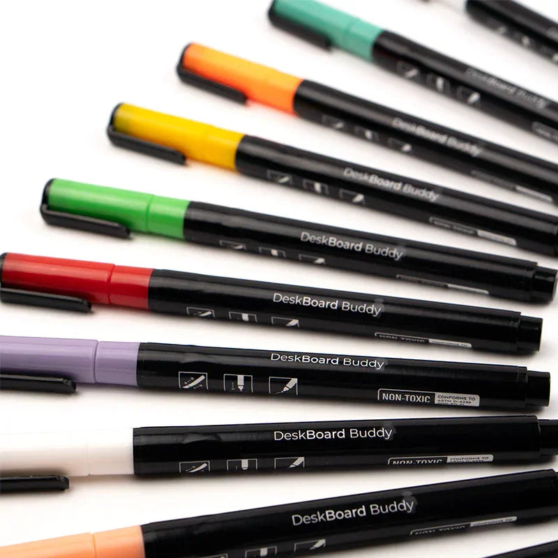 Assorted DeskBoard Buddy dry erase markers with colorful caps for office or school desk organization.