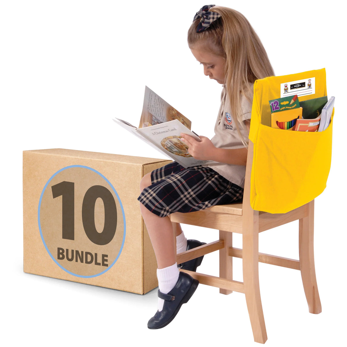 Schoolgirl reading on a chair with a yellow seat organizer, cardboard 10-bundle box nearby