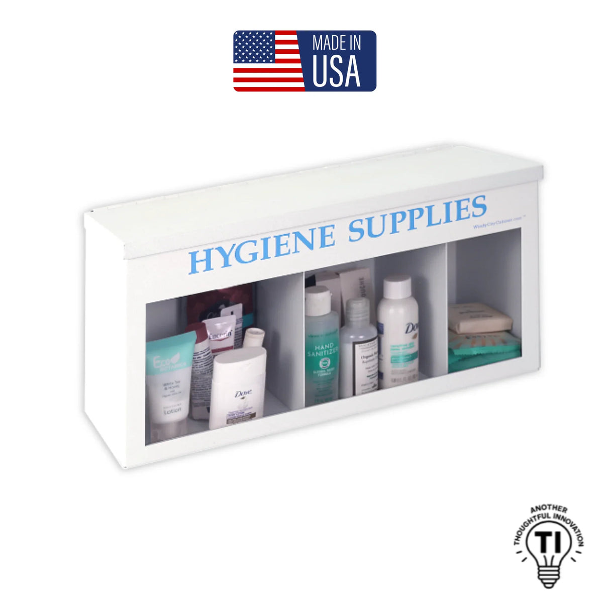 Wall-mounted hygiene supplies dispenser with toiletries, made in USA label visible.