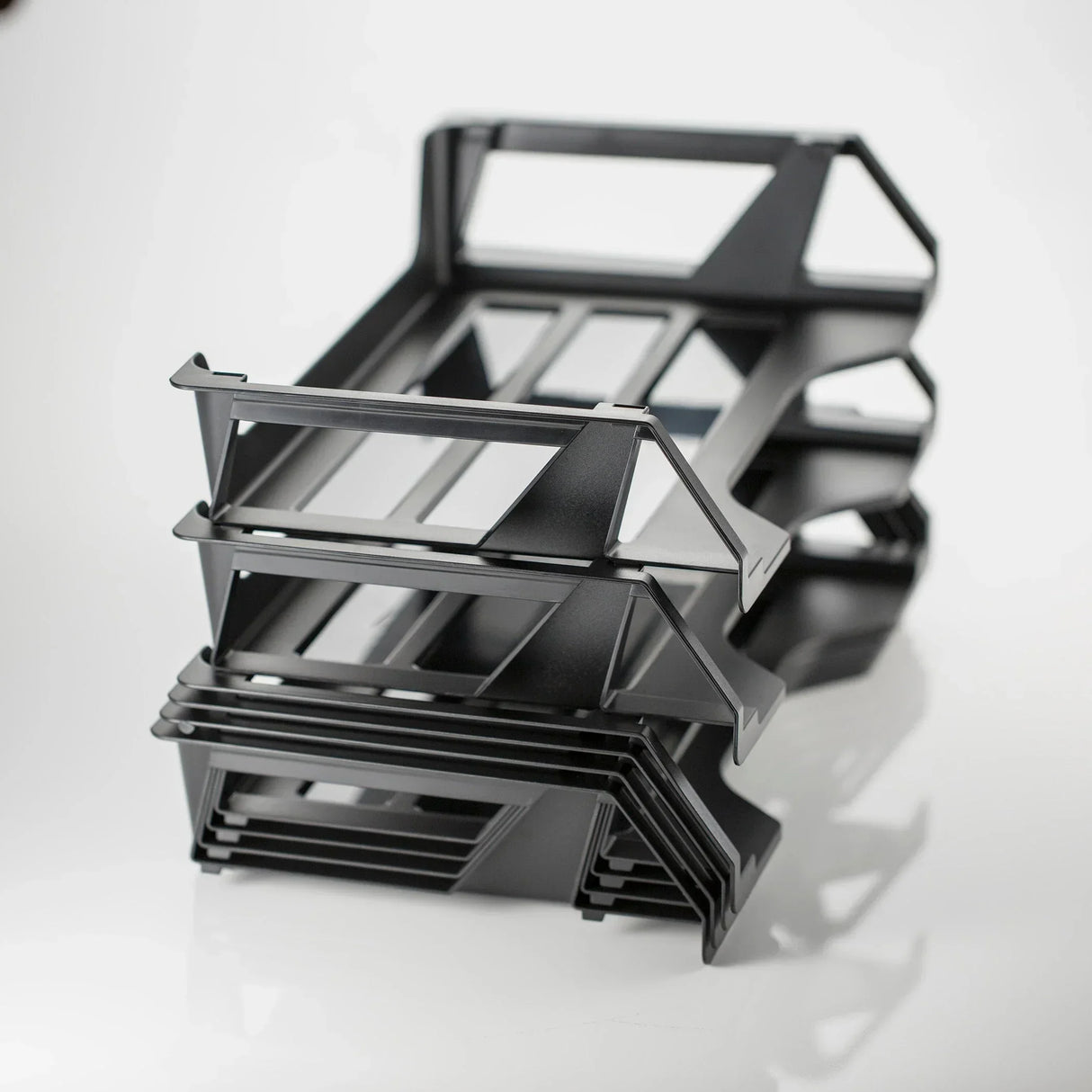 Black multi-tier desk organizer for office supplies and workspace efficiency