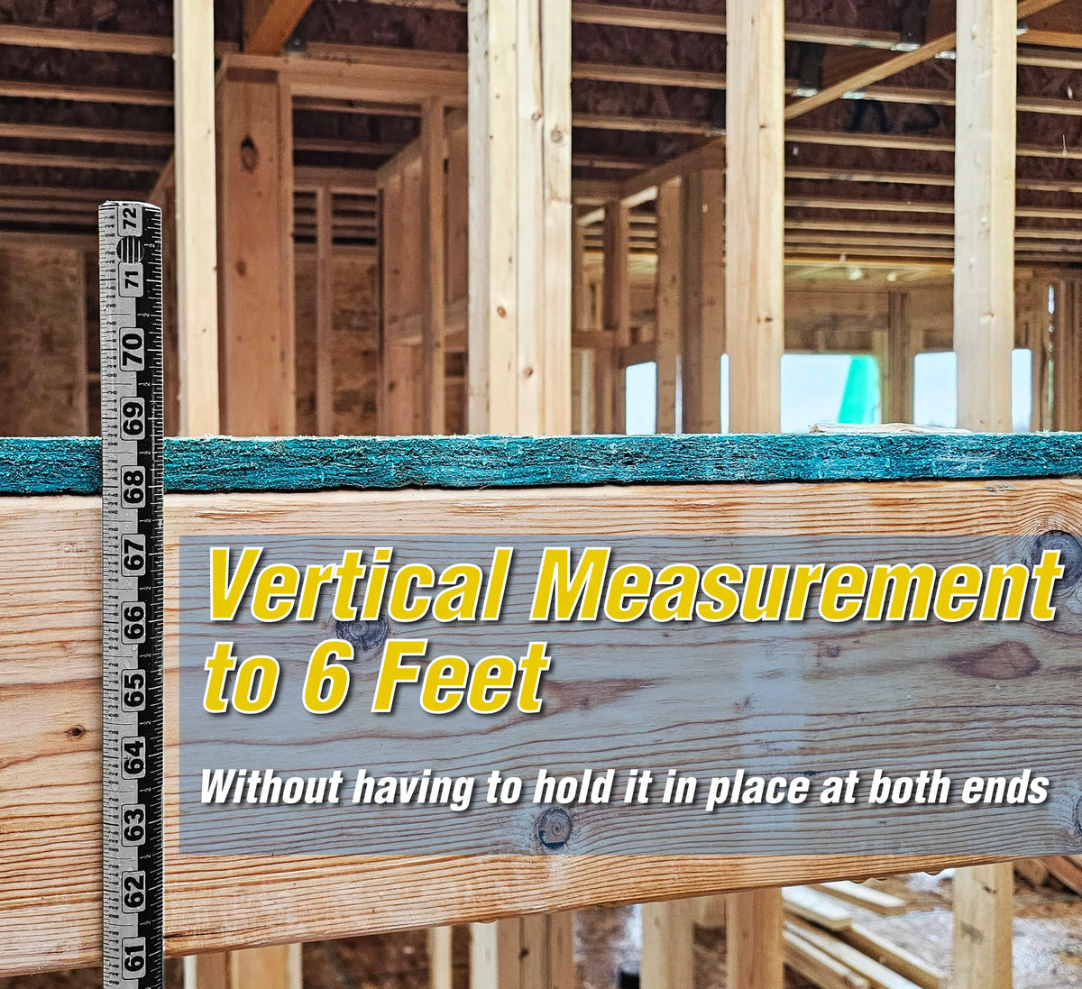 Victor® Zip Stick 72 inch ProSpan magnetic measuring tool held against wooden wall framing.
