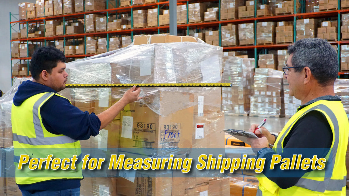 Workers measuring shipping pallets in warehouse with tape measure