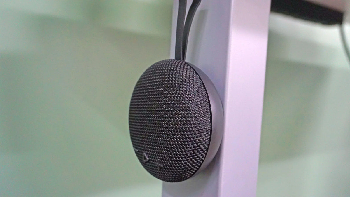 Victor® MagnetPlus magnetic wireless speaker attached to a white metal support beam