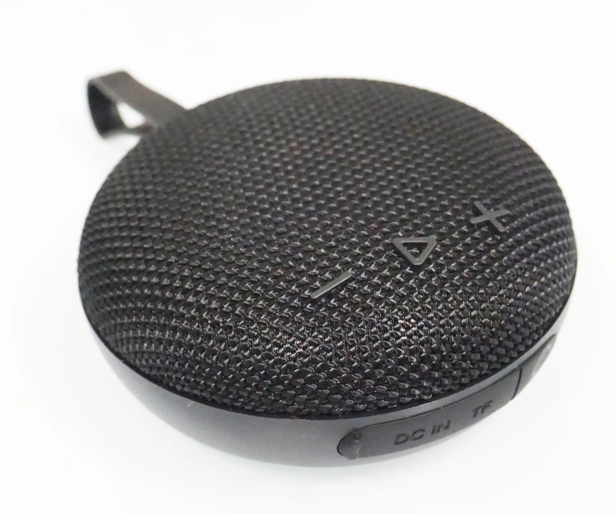 Black Victor® MagnetPlus magnetic wireless speaker with mesh fabric and control buttons