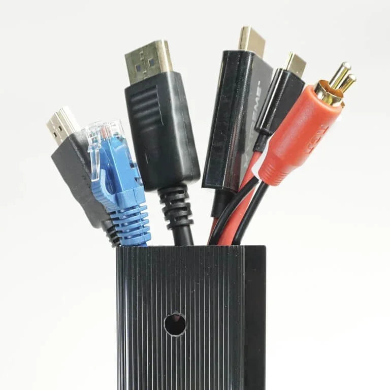 Various electronic cables held inside an Officemate Magnetic Cable Raceway