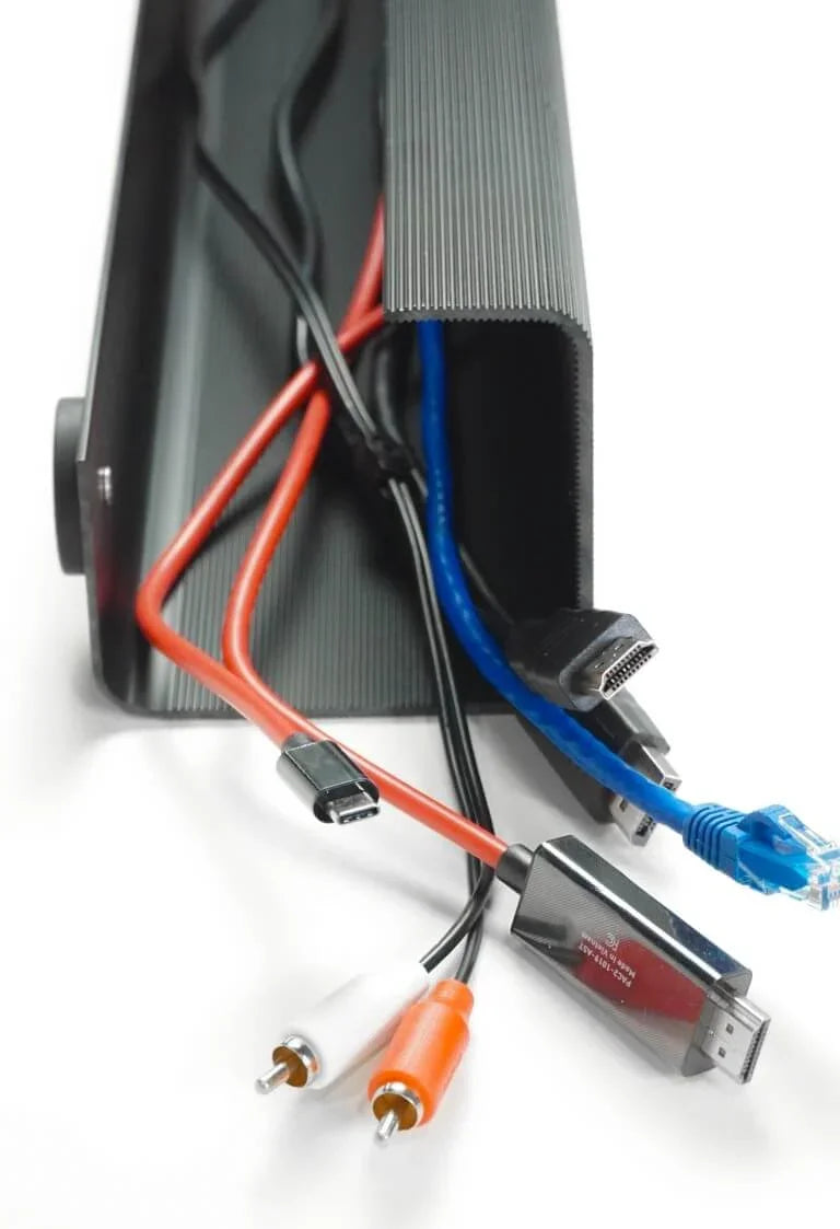 Officemate® MagnetPlus Magnetic Cable Tray organizing various red, blue, and black cables.
