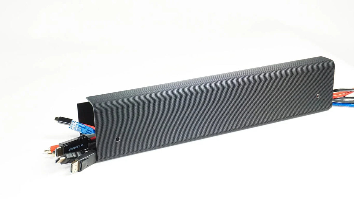 Officemate® MagnetPlus Magnetic Cable Tray in black organizing various electronic cables