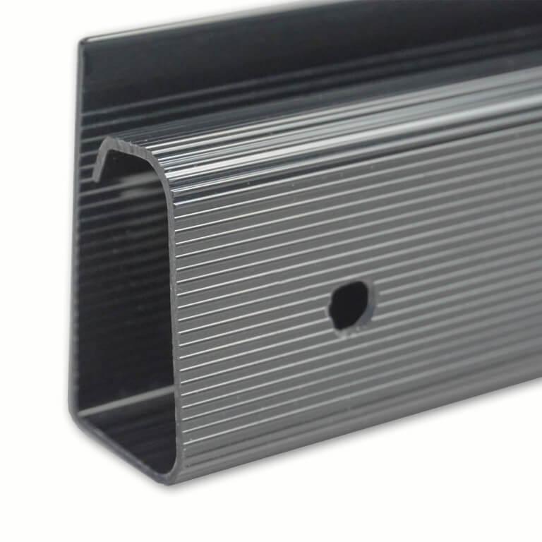Close-up of a gray Officemate® magnetic cable management bundle channel.