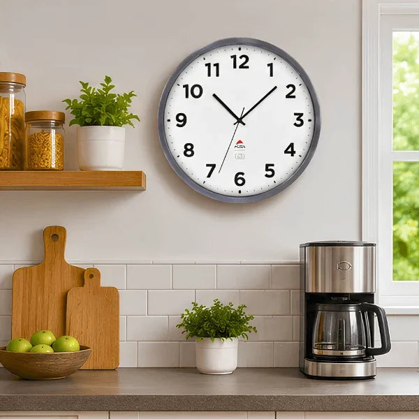 Alba Extra Inoxydable indoor outdoor wall clock in silver grey mounted in a kitchen setting