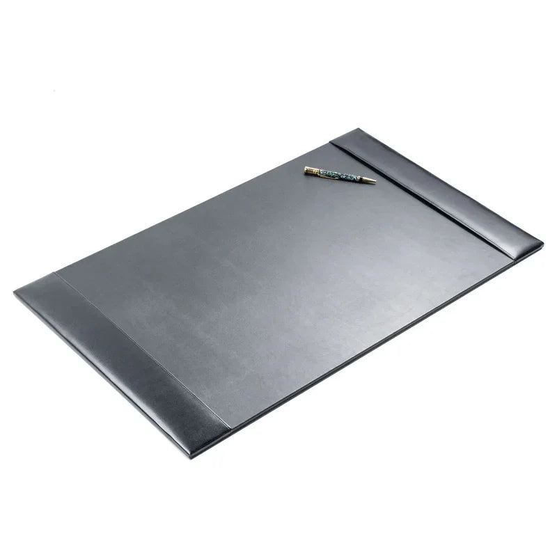 Black bonded leather desk pad with a pen on white background, office desk accessory