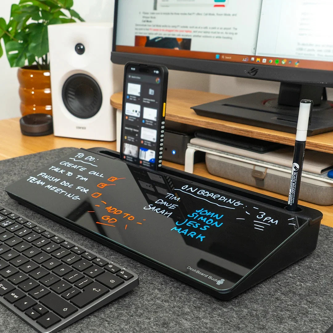 DeskBoard Buddy dry erase board organizer with a smartphone and marker on a desk.