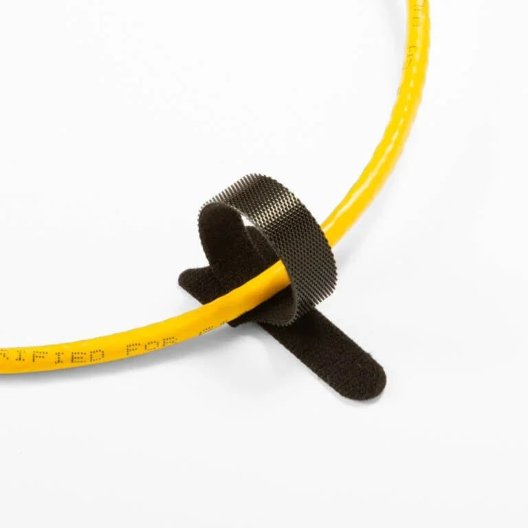 Black Victor® hook-and-loop cable tie securing a yellow power cable.