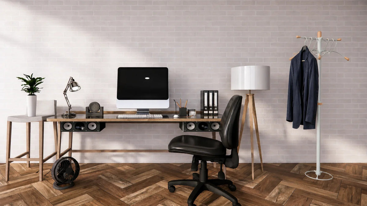 Alba Wave freestanding coat stand with a blue blazer in a modern home office setting.