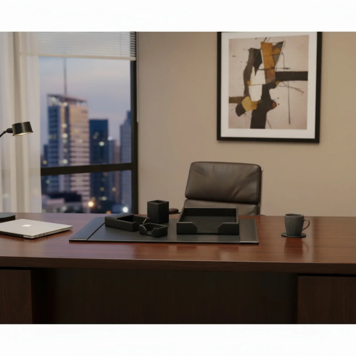 Black bonded leather 5-piece desk organizer set on modern office desk with city view