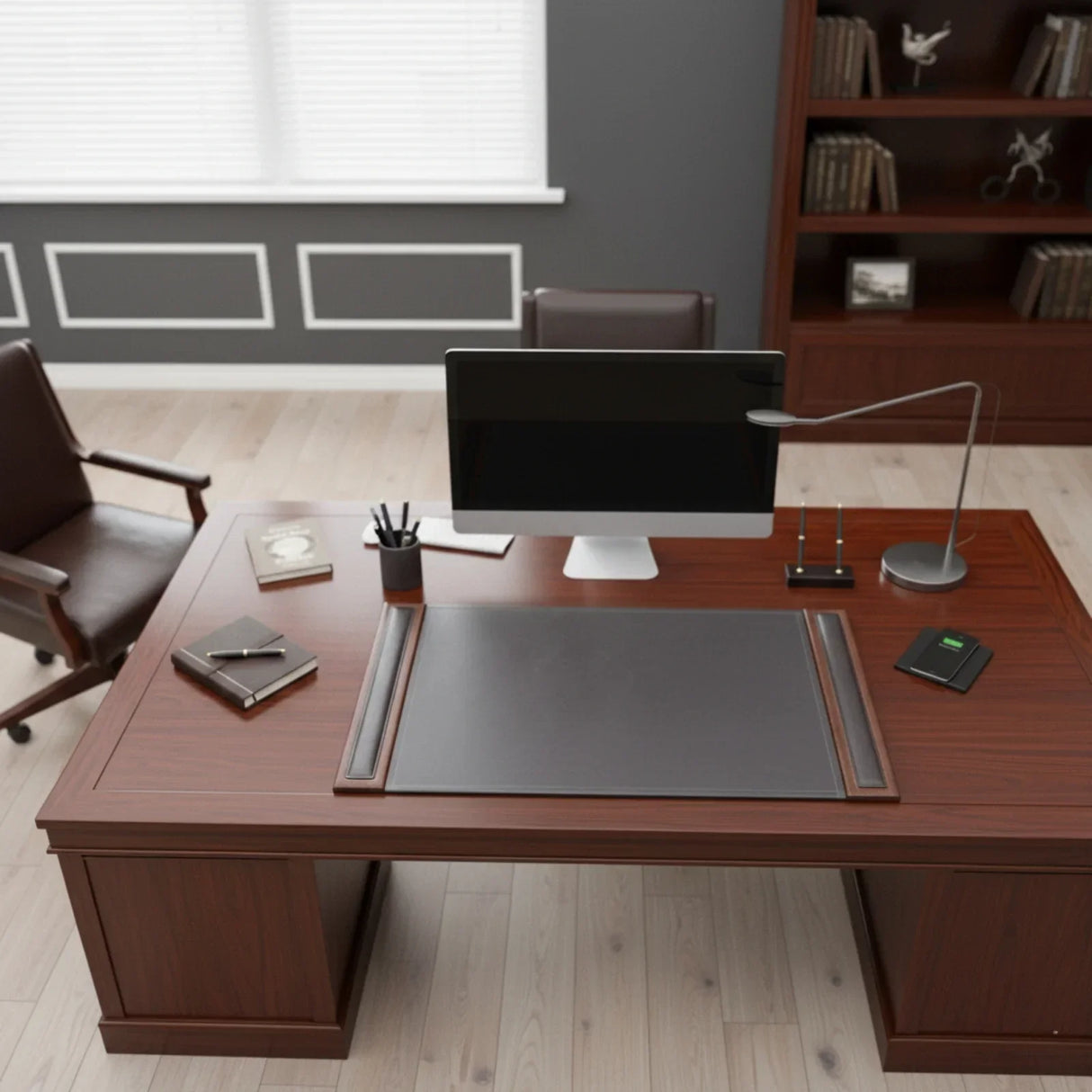 Walnut and black leather desk pad on wood office desk with computer in modern workspace