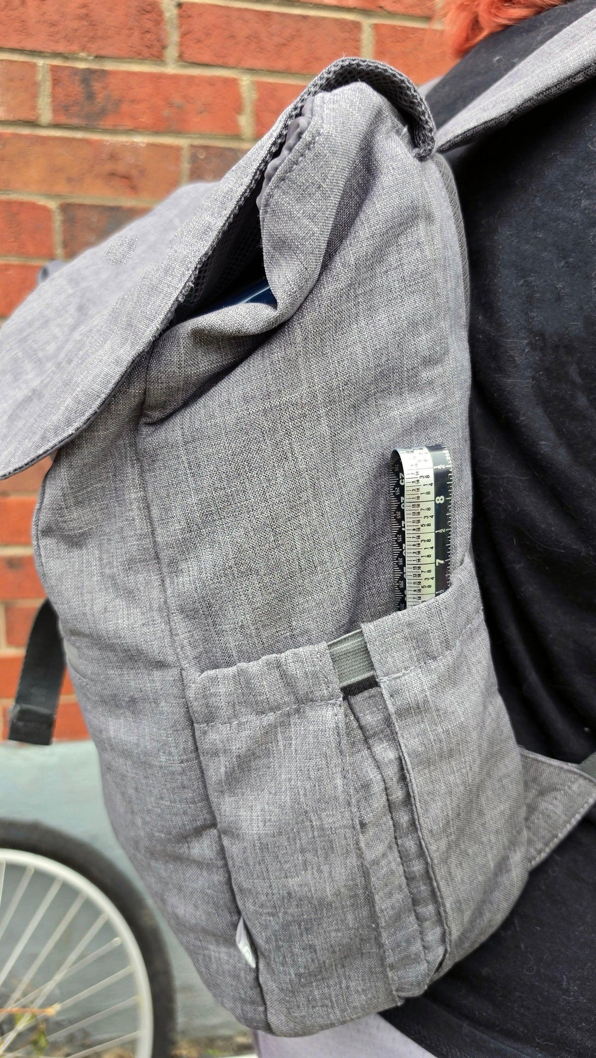 Victor Zip Stick 18-inch magnetic ruler tucked into a grey fabric bag pocket