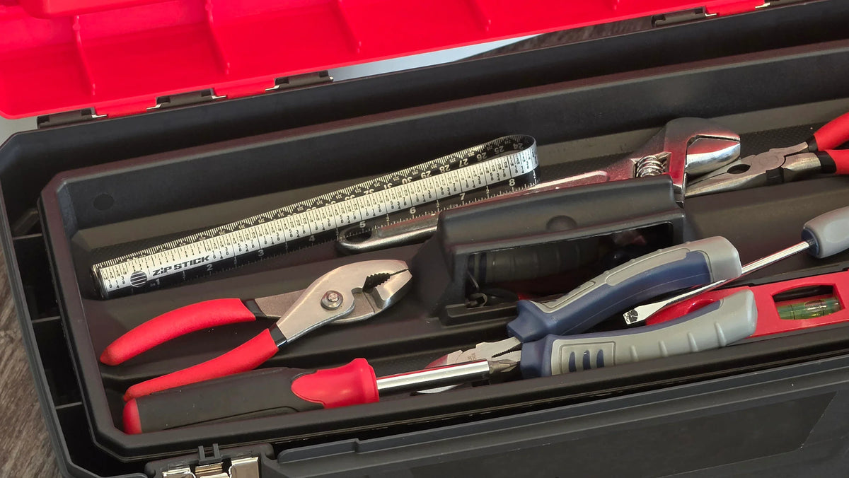 Victor® Zip Stick magnetic ruler in a black tool box with pliers and wrenches