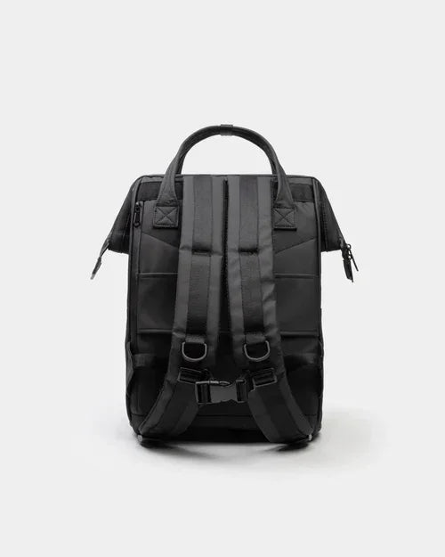 Black backpack with padded straps and top handle, ideal for school or office use