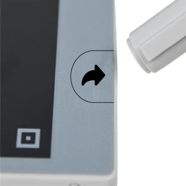 Close-up of electronic device corner with screen, arrow symbol, and white button on white background