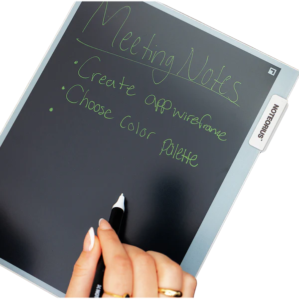 Hand writing meeting notes on digital LCD writing tablet for office or school use