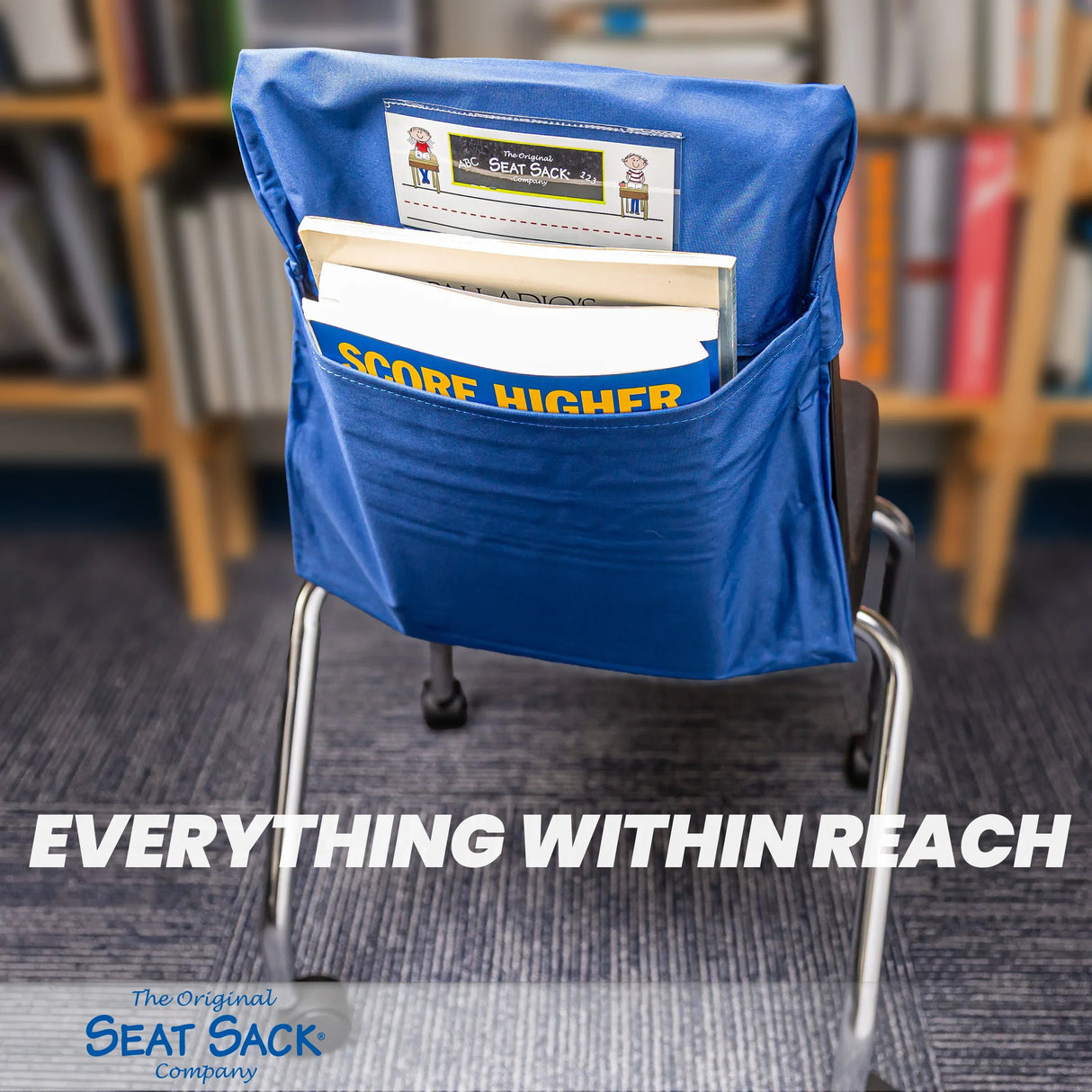 Blue Seat Sack classroom chair pocket organizer holding books and folders on chair back.