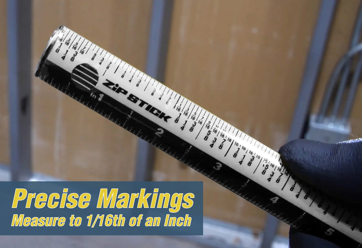Close-up of a Victor Zip Stick magnetic ruler showing precise markings down to 1/16th of an inch.