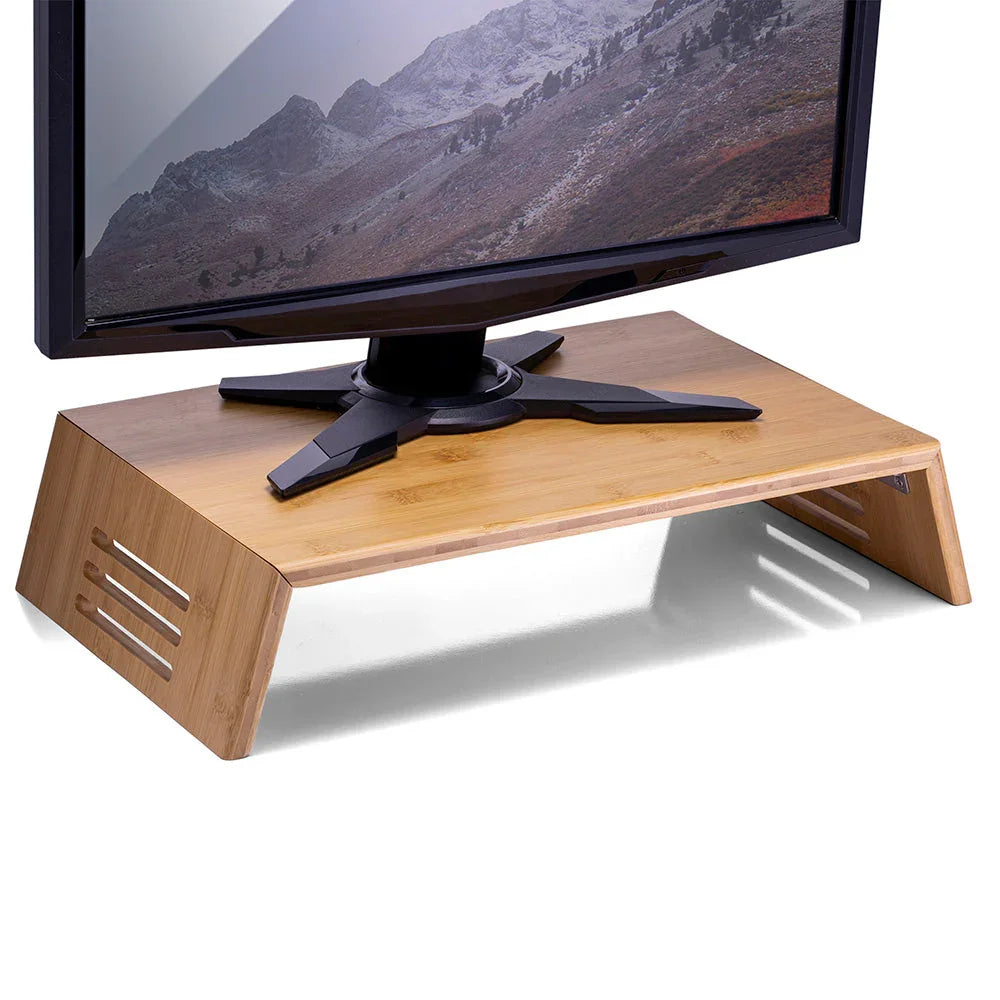 Bamboo monitor stand with raised platform, supporting a computer screen, for ergonomic desk organization
