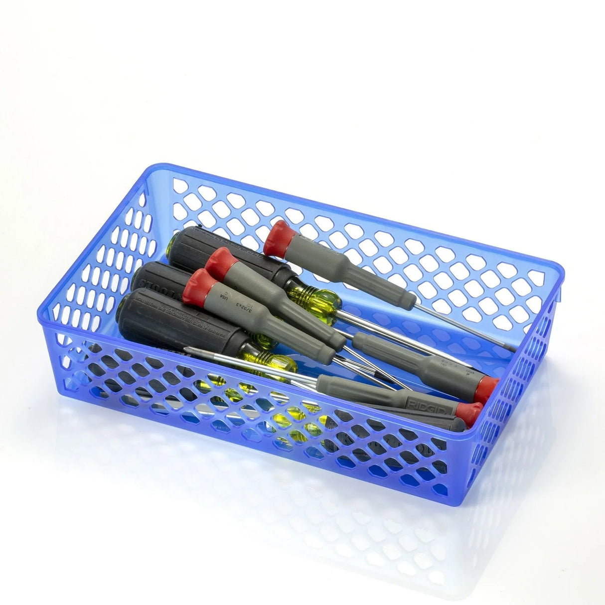 Blue plastic supply basket filled with assorted screwdrivers on a white background