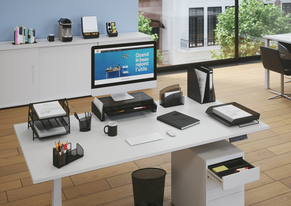 Modern office desk with mesh metal magazine holder, file organizer, and workspace accessories