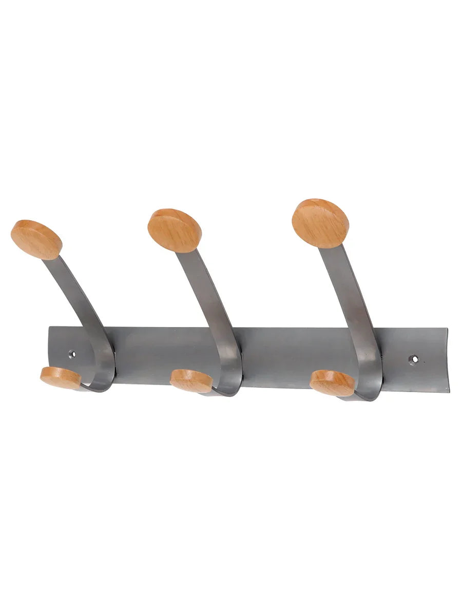 Wall-mounted coat rack with three metal hooks and wood pegs, minimalist design
