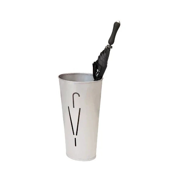 Metal oval umbrella stand with cutout design, holding a closed black umbrella