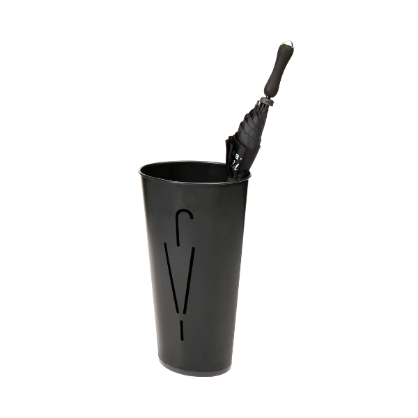 Black metal oval umbrella stand with modern cutout design holding a closed black umbrella