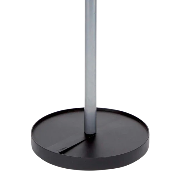 Close-up of a modern garment rack round metal base and upright pole