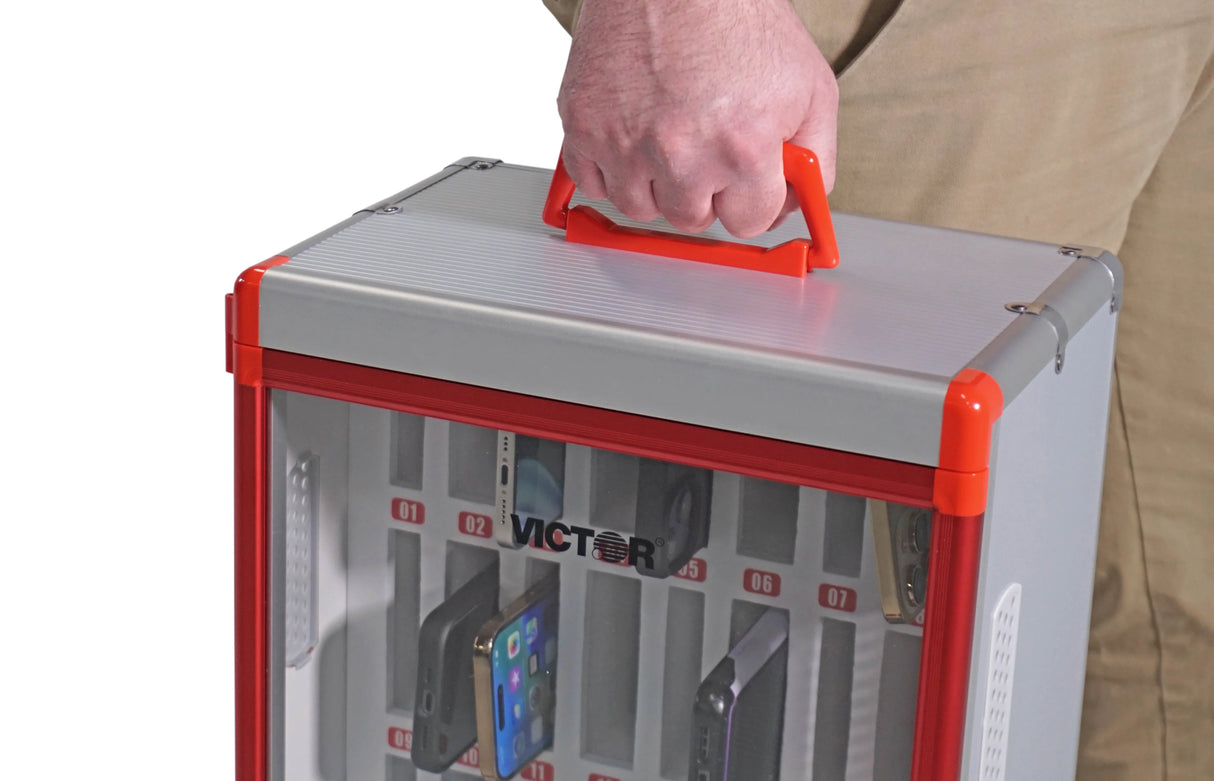 Portable cell phone locker with a red handle, holding multiple smartphones in numbered slots.