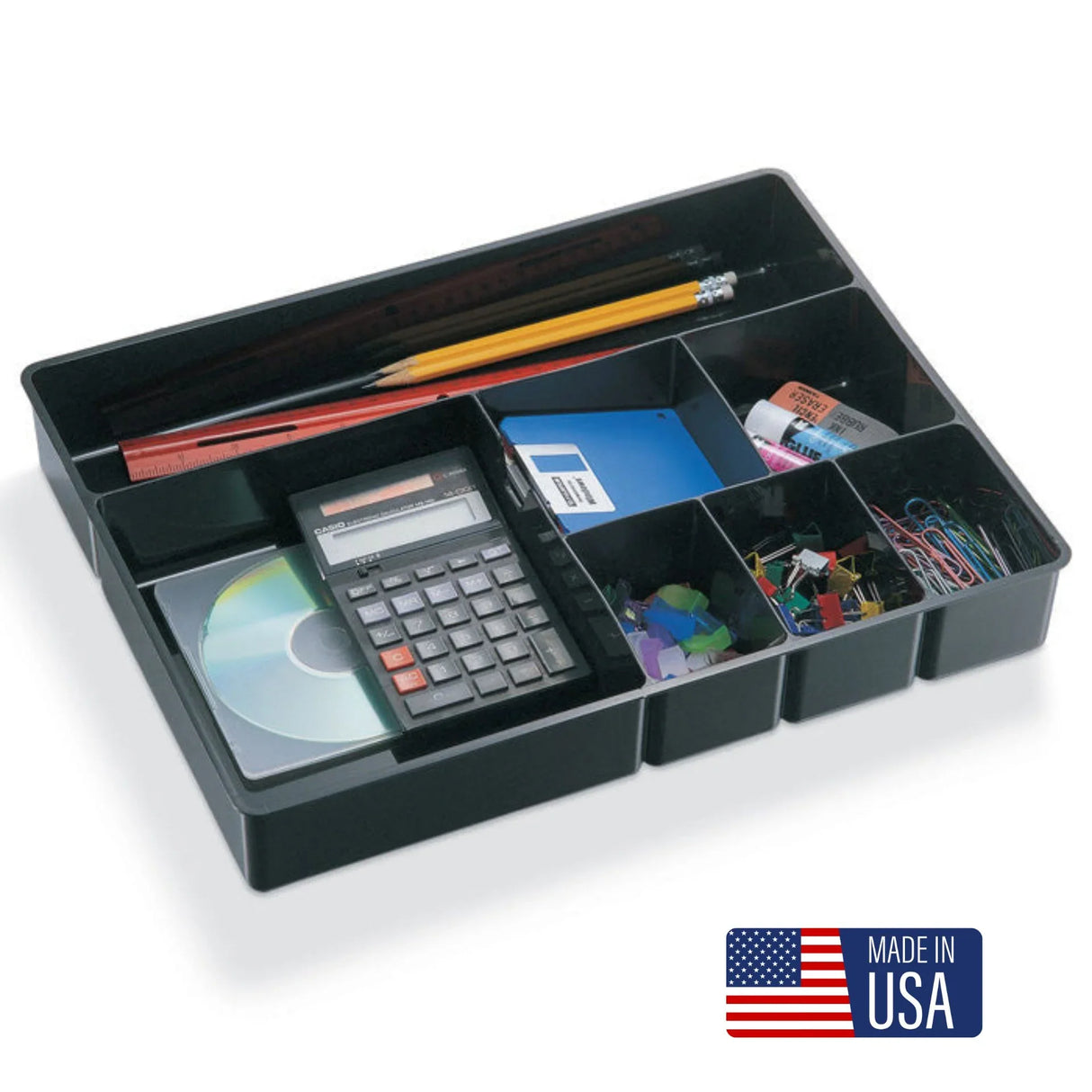 Deep desk drawer organizer tray with compartments holding office supplies like pencils, calculator, paper clips, and erasers.