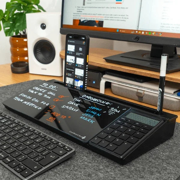 Black desk organizer with calculator, whiteboard, and phone stand for office productivity