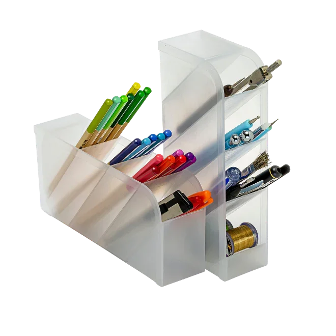 Clear plastic desktop organizer holding pens, pencils, markers, scissors and office supplies