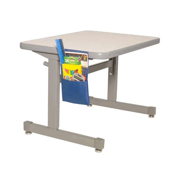 Adjustable height desk with a blue pocket holding school supplies on a white background