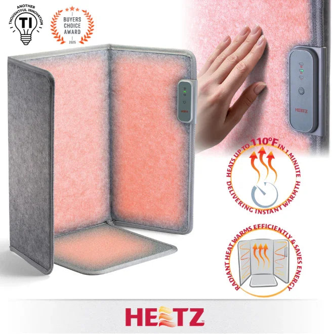 Portable foot and leg radiant heater with control panel, glowing heating panels, hand for scale