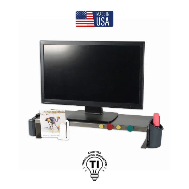 Monitor riser with magnetic buttons, organizer cups, and calendar on a white background
