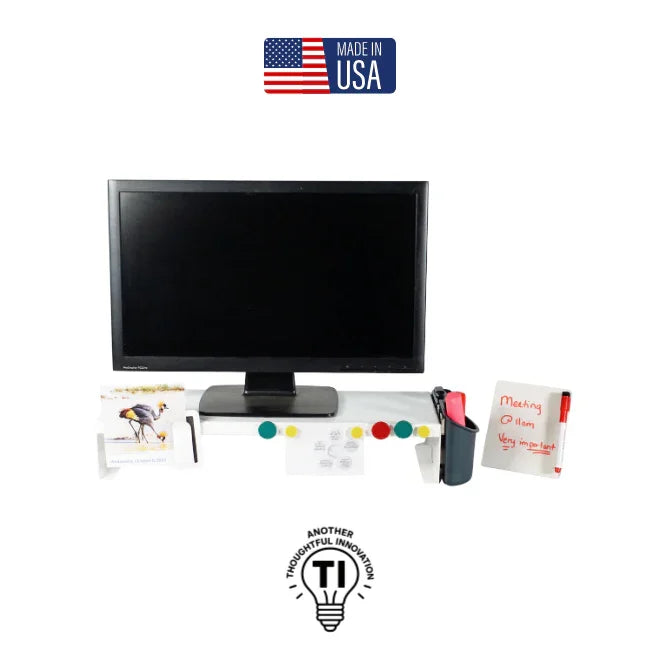 Monitor riser with desktop organizer, calendar, pen holder, sticky notes, and memo board