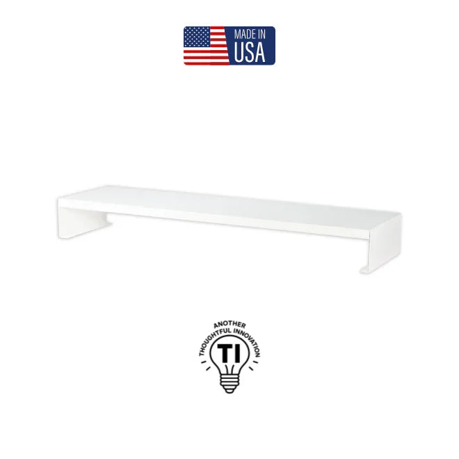 White metal monitor riser for desk organization, Made in USA label, minimalist design