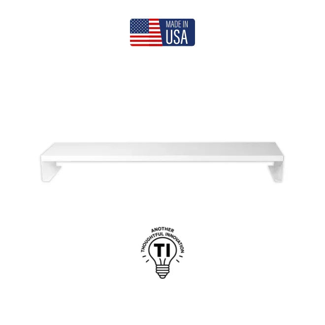 White desktop monitor riser stand with clean design, Made in USA label above, on white background.