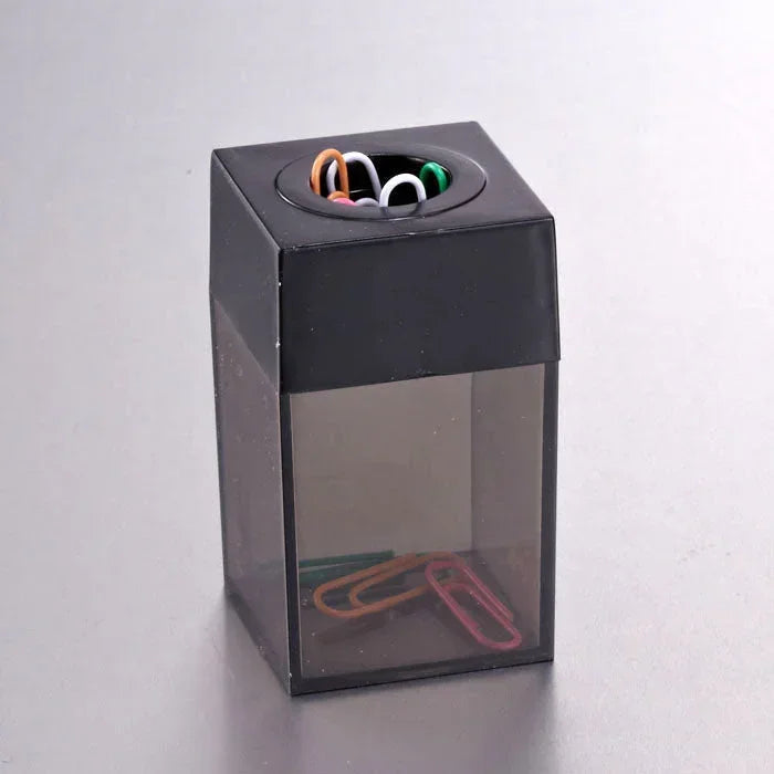 Black and clear plastic paper clip dispenser with colorful clips, ideal for office or school organization