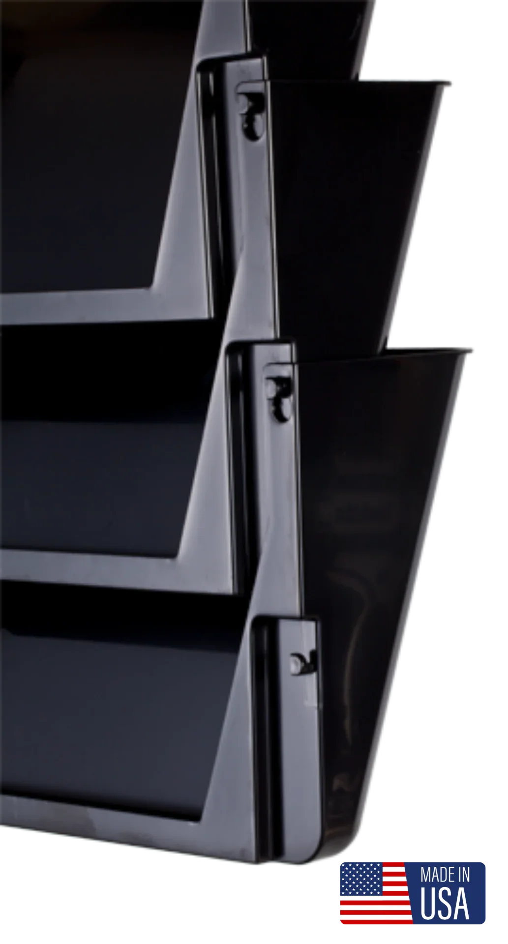 Black plastic wall file organizer with three stacking pockets, shown close-up